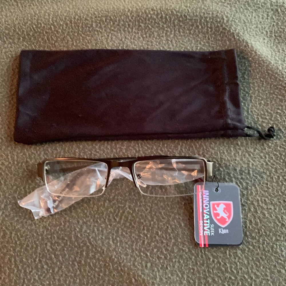 NWT Men’s Khan sleek innovative design glasses. Small scratch on left lens.